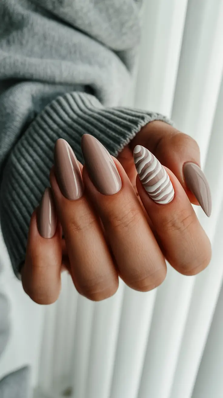chic pretty spring nails design 2026 Warm taupe almond with sculpted ripple texture
