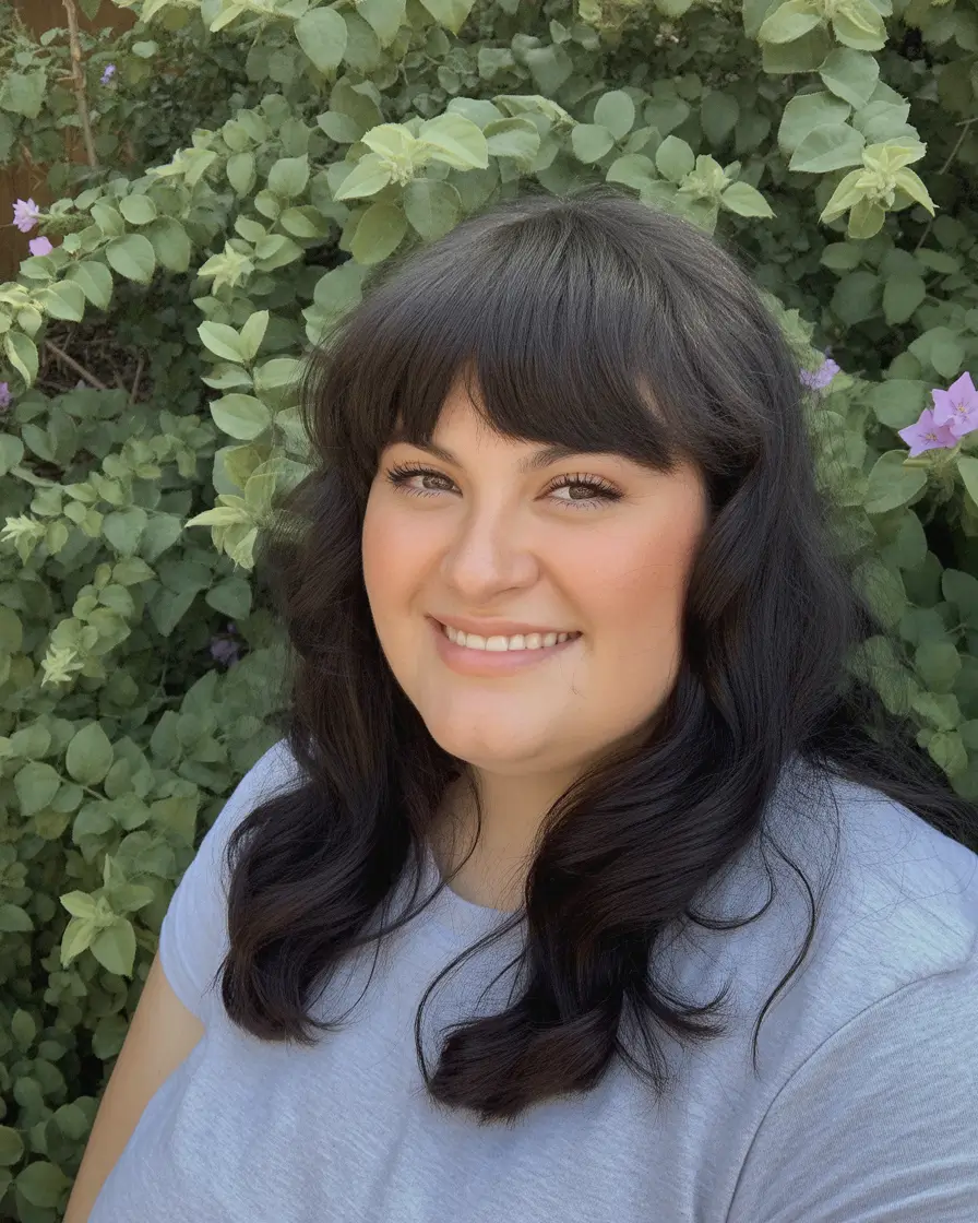 Modern Spring Haircuts For Plus Size Women 2026 Loose Waves With Blunt Full Bangs